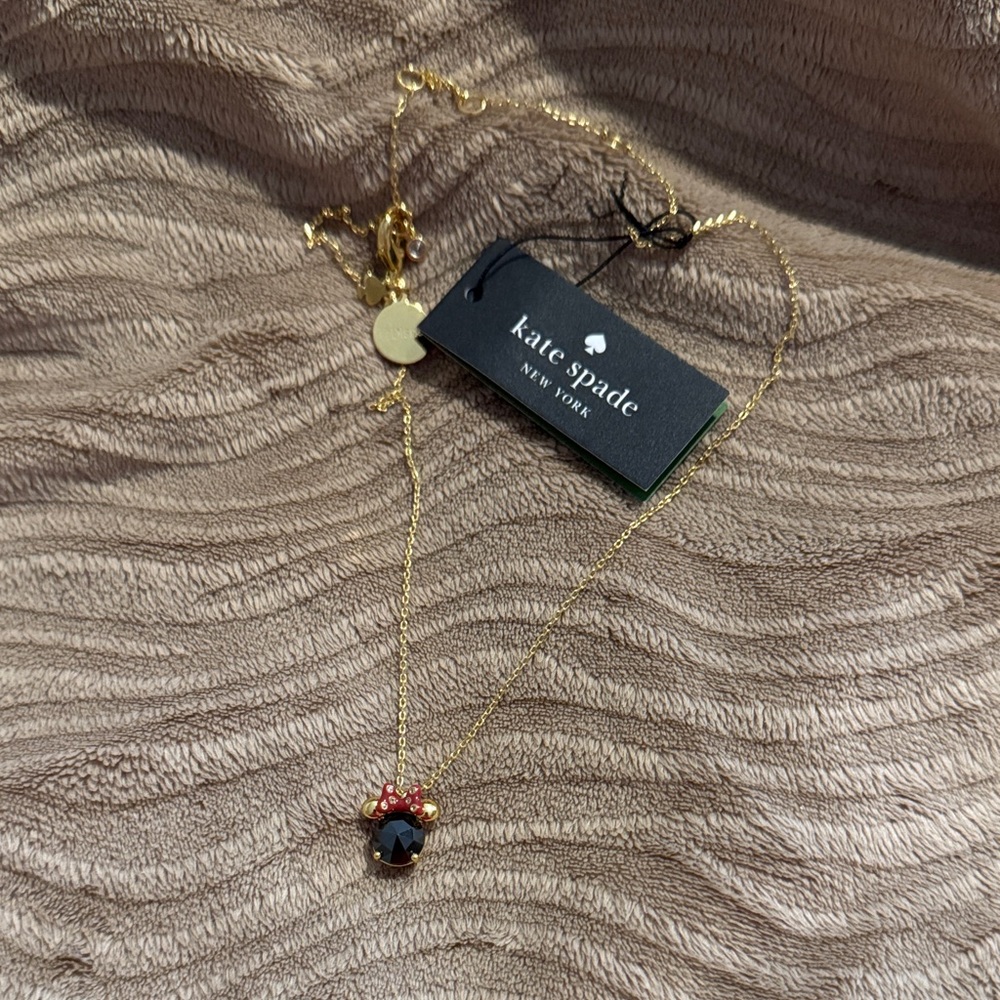 Kate Spade Gold Necklace with Dark Red Accent